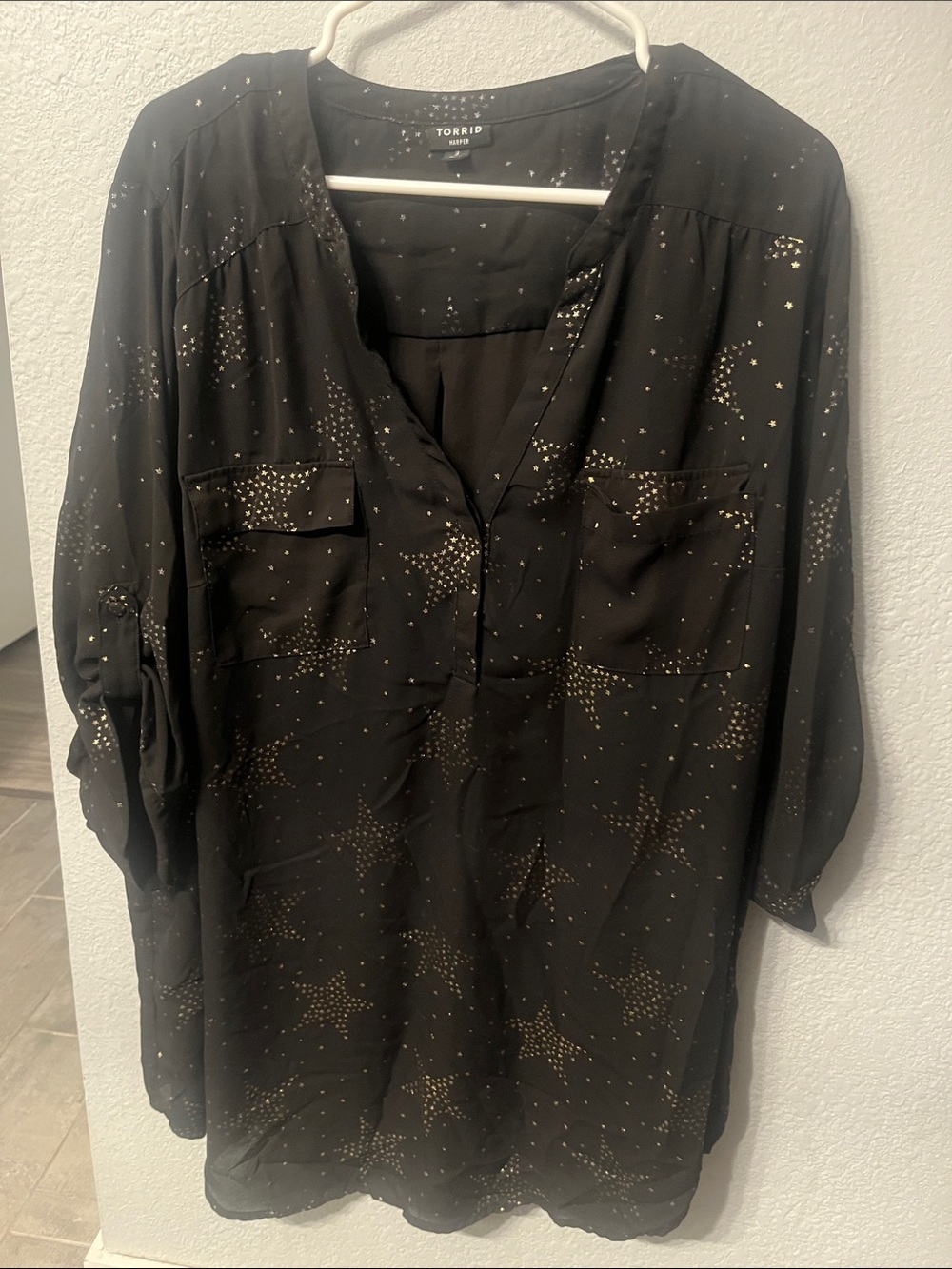 3 | Torrid Black Star-Print V-Neck Tunic with Gold Star Accents